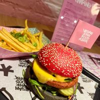 VJFB Cruelty Free Burger: "beeef" on a black/pink bun, cheeze, lettuce, tomato, pickles, VJFB sauce at Vegan Junk Food Bar -  L'Eixample in Barcelona