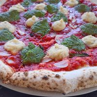 Vegan pizza with cashew ricotta and vegan pesto at Pizzicletta - Pheonix in Flagstaff
