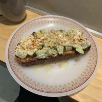 Café de avena y tostadas aguacate   at Dale Café  in Madrid