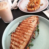 Muhammara sandwich and pumpkin tostada. Iced chai and brew coffee. at Dale Café  in Madrid