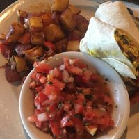 Tofu scramble wrap with home fries at Busboys and Poets in Hyattsville
