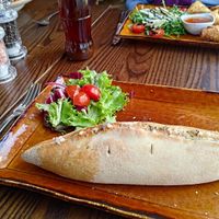 The Turkish boat pide, with vegan cheese   at Dinnio in Hertford