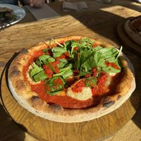 Anacardi - homemade cashew ricotta, caramelised onions, tomatoes, chilli sauce, spinach and olive oil   at The Lost Kitchen in Tiverton