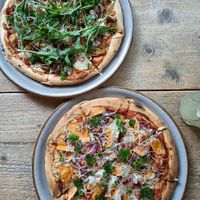Shrrom (top) & Batate pizzas. at NOAH in Mainz
