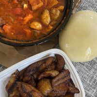 Vegan red stew with eba fufu, & a side of fried plantains   at Aduke Nigerian Cuisine & Lounge in Inglewood