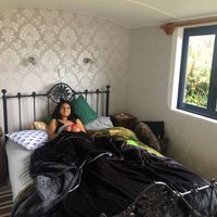 The comfy, bright and warm bedroom. at The Tram @ Shambhala in Okato