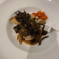 Braised mushroom and collard greens over baguette  at Commander's Palace in New Orleans