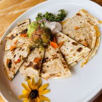 Quesadilla…delightful, flavorful. I always love flowers on my plate!  at Hi Flora! in Minneapolis