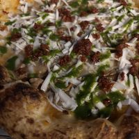 Der Käse ist nicht wirklich geschmolzen, aber es war trotzdem eine sehr cremige Pizza  at Meditè Siracusa in Siracusa