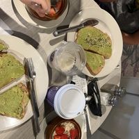 Very tasty avocado toast, oatmeal with berries, side of oat milk  at SPoT Coffee in Niagara Falls