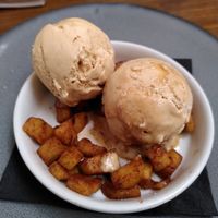 Vegan dessert with apple and caramel ice cream at The Old Courthouse in Caernarfon