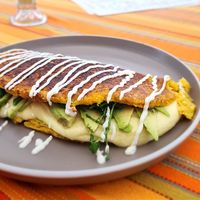 La arepa que parece chorreada y que no me gustó la combinación de sabores, pero a mi amigo si. at Imenü in Escazu