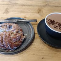 Blueberry knot and oat milk hot chocolate 😁 at The Milkman   in Peebles