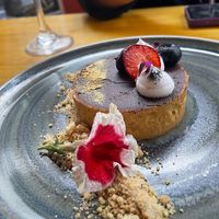 Vegan cake with peruvian chocolate and berries at Lounge del Brujo Centro Histórico in Arequipa