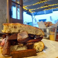Homemade Focaccia with vegan lomo saltado based in seitan at Lounge del Brujo Centro Histórico in Arequipa