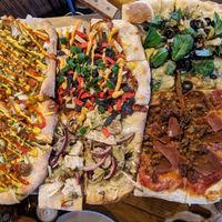 Vegan pizza flight (westerdog is the best!) at The Mitten Brewing Co in Grand Rapids
