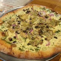 Vegan 'chicken' pesto pizza at The Mitten Brewing Co in Grand Rapids