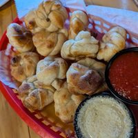 Garlic knots (vegan with the Parmesan on the side) at The Mitten Brewing Co in Grand Rapids
