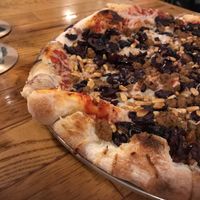  Vegan cheese, vegan sausage, pine nuts and black olive pizza : ) at The Mitten Brewing Co in Grand Rapids