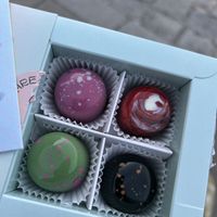 double caramel, strawberry nougat, pistachio white chocolate, white chocolate pumpkin 13€  at Dulceria in Vienna
