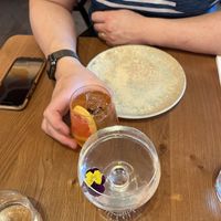 Cocktails - a coffee one (the orange one) and Genmaicha martini   at Mallow - Canary Wharf in East London