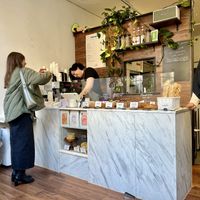 Counter view from one of two window tables   at TheDorkyFrench Vegan Bakery in Glasgow