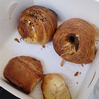 Sausage roll, no ham and cheeze roll, madeleine, mini pain au chocolat at TheDorkyFrench Vegan Bakery in Glasgow