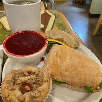 Vegetable gazpacho, with a vegan chicken sandwich, gunpowder green tea, and a vegan peach muffin. So good!  at Webster's Cafe in State College