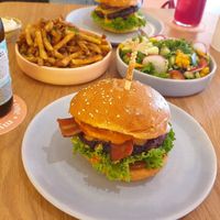 Bravocado burger, fries, side salad at Hulala in Dusseldorf