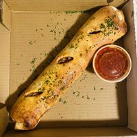 Vegan Meatball Stromboli with dairy-free cheese and Marinara Sauce   at Angry Italian in Yuma