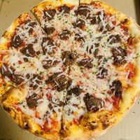 Dairy-free cheese pizza with vegan meatballs   at Angry Italian in Yuma