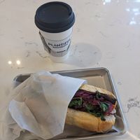 Banh mi sandwich and a mushroom latte at Plantiful Superfoods - Capitol Hill in Seattle