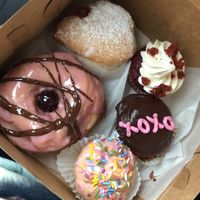 Jelly filled heart shaped donut along with other valentine themed goodies   at Sweet Theory Baking Co. in Jacksonville