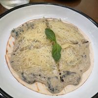 Mushroom truffle pizza   at Wild & The Moon in Doha