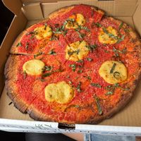 Vegan margherita pizza with gluten-free crust at Wild Flour Pizza Co in Burnaby