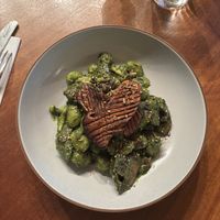 Mixed mushroom gnocchi with cavolo Nero pesto and mixed toasted seeds. My non vegan partner said this was better than his (most expensive) dish!  at The Glenelg Inn in Glenelg