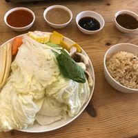 they bring a lot of cabbage, I dipped it into the peanut sauce, yum at Kinn's The Buta in Udon Thani