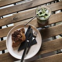 This is definitely an outside table which is not the best choice for cutlery and such.  at Crave Coffee & Bakery in Rotterdam