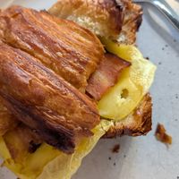 Bacun-cheez croissant at Crave Coffee & Bakery in Rotterdam