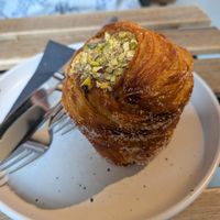 Pistachio cruffin at Crave Coffee & Bakery in Rotterdam