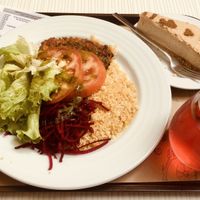 Vegan burger, rice and salad with garlic pesto dressing and tofu coconut cheesecake - yum! at Bioforma in Funchal