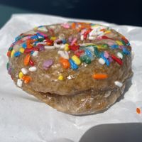 Vegan frosted sprinkle donut  at Sweet Crimes Gluten-Free Bakery in Washington