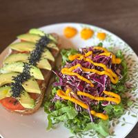 Avocado Toast with salad. The Salad is so delicious and refreshing.   at Feelovesophy in Uvita