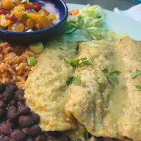 Vegan enchiladas, rice, beans,  peach salsa at The Roadhouse Mexican Bar & Grill in Benzonia