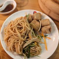 Dan Dan noodles (left) and salt and pepper tofu (right). at Chiho Bistro in Seattle