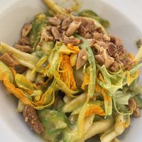Romagnoli al pesto di fiori di zucca  at Trattoria del Tempo Buono in Bologna