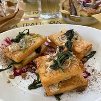 Panelle with mushrooms and spinach   at Trattoria del Tempo Buono in Bologna