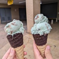 Mint choc chip ice cream with choc topped cone at Scooped in Scarborough