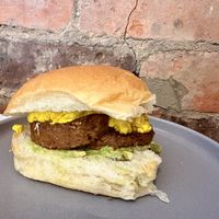 Breakfast roll with avocado, vegan haggis and tofu scramble   at Papercup Motherwell in Motherwell