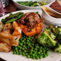 Vegan Roast of a butternut squash and 'meatfree stuffing'. Greens on far side I payed extra for. at The Kingfisher in Northwich